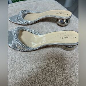 Kate Spade Silver Metallic knotted straps sphere heeled slides. NWOB size 9.5